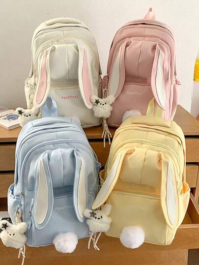 2026 Nueva mochila de nailon con orejas de conejo, disponible en blanco/rosa/azul/amarillo, estilo universitario casual para mujer, mochila escolar de gran capacidad con múltiples bolsillos, mochila minimalista que se puede decorar con dijes, adecuada para llevar libros, archivos, papelería, tabletas, ropa, etc. Ideal para estudiantes, viajes de negocios, escuela secundaria/universidad, regreso a clases, regalos para niñas, mujeres, vacaciones, cumpleaños, San Valentín, Navidad