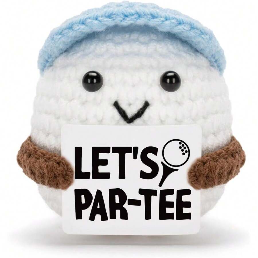 This Adorable Crochet Golf Ball Plush Comes Ready To "Par-Tee" With Its Cheeky Sign, Making It The Perfect Playful Companion For Golf Lovers Of All Ages. It's A Hole-In-One Way To Bring Fun And Personalized To Any Desk, Golf Bag, Or Living Space. - Multicolor - View 1