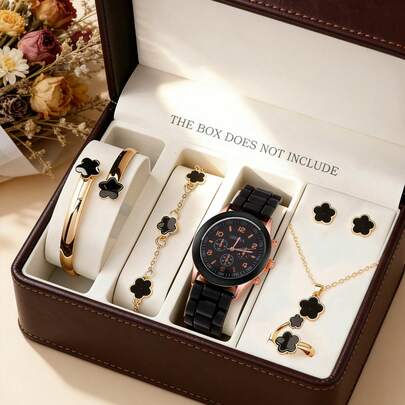 7件套奢华轻盈黑色花瓣女士腕表套装，包括一款多功能黑色表盘石英表、四叶草手链、手镯、项链、戒指和女士耳钉。玫瑰金表壳搭配黑色硅胶表带，尽显优雅品味。