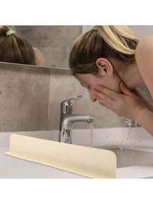 Tấm chắn nước đa năng bằng silicon dùng cho bồn rửa, mặt bàn bếp, phòng tắm, và các khu vực xung quanh bồn rửa mặt. Tấm chắn nước này có thể tái sử dụng và dễ dàng vệ sinh, thích hợp cho mép bồn rửa, nhà bếp, phòng tắm và mặt bàn bồn rửa mặt. - Xem 2