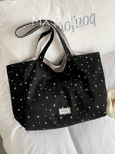 1个女士条纹单肩手提包，大容量，饰有五角星图案，双面可用，适合通勤、购物、上学等场合。