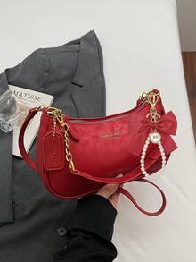 全新高品质PU材质，粉色蝴蝶结吊坠设计，金属拉链闭合，顶部配有可调节金属链带，优雅时尚，适合肩背、手提或斜挎，非常适合女孩通勤、外出、购物、约会和日常活动。 - 紅色 - 查看 5