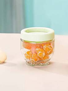 2 hũ thủy tinh nhỏ hình chân mèo, có nắp đậy kín, dùng để đựng ngũ cốc, trái cây khô và đồ ăn nhẹ. - Xem 4