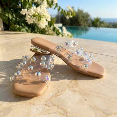 New Product Sells Well: Transparent Water Droplet One-Piece Strap Girls' Flip-Flops. Transparent PVC + Nude PU Shoe Bed. Glittering Full Coverage Water Droplets. Round Toe, Low Heel, Metal Edge. Light Luxury And Exquisite Style. Ideal For Vacation And Daily Wear In Spring And Summer!