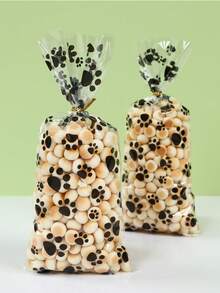 50pcs Plastic Paw Print Gift Bags With Twist Tie, Pet Treats Candy Bags, Portable Pet Bags, Puppy Paw Print Pattern Gift Packaging Bags, Pet Decoration, Baby Shower Party Decoration, Gender Reveal Party Decoration, Puppy Birthday Party Decoration, Dog Paw Print Gift Packaging Bags, Puppy Paw Print Cookie Baking Bags, Plastic Bags, Shopping Bags, Pet Theme Party Supplies, Holiday Party Supplies, Party Favors - Black and White - View 5