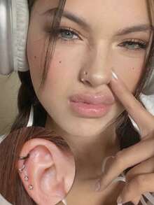 Bộ 4 khuyên mũi gồm [2 khuyên mũi + 1 dụng cụ nong lỗ xỏ + 1 dụng cụ gắp bi]. Khuyên mũi hình móng ngựa bằng thép không gỉ, đính đá Cubic Zirconia 3mm, dành cho nữ. Khuyên mũi cỡ 18G với các hình trái tim, ngôi sao và hình tròn. Thích hợp cho môi, lông mày, vành tai, hình móng ngựa, vách ngăn mũi và các vị trí xỏ khuyên khác. Đá Cubic Zirconia màu trắng và hồng. - Nhiều màu - Xem 8
