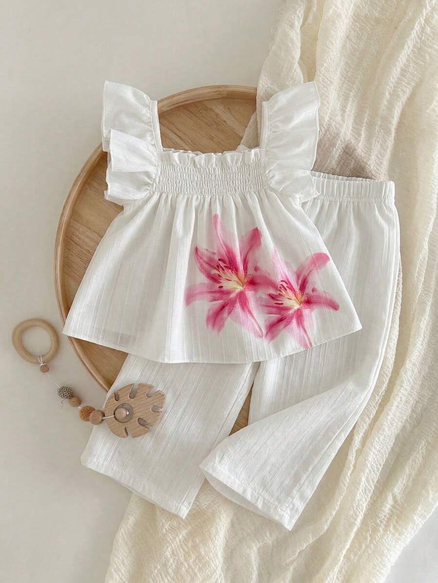 Bộ đồ bé gái in họa tiết hoa ly và sọc kẻ, gồm áo tay ngắn nhún bèo nhẹ nhàng và quần ống rộng, trang phục thường ngày/du lịch tươi mát và thanh lịch, thích hợp cho mùa hè. - trắng - Xem 1