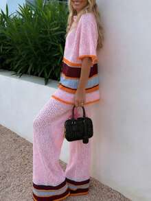 2026春夏新款女士撞色条纹翻领开衫短袖阔腿针织两件套，采用镂空针织面料，这款美式街头风套装散发着活力四射的个性魅力。非常适合海滩度假、休闲放松、海岛之旅和泳池派对，尽显成熟优雅气质。是假日装扮和海滩造型的理想之选。粉色 - 粉色 - 查看 8