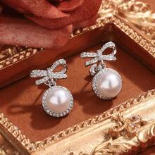 Bông tai hình nơ đính đá Zirconia siêu nhỏ và ngọc trai giả, thiết kế sang trọng độc đáo, trang sức cao cấp dành cho tiệc bãi biển. - Loại bướm - Xem 5