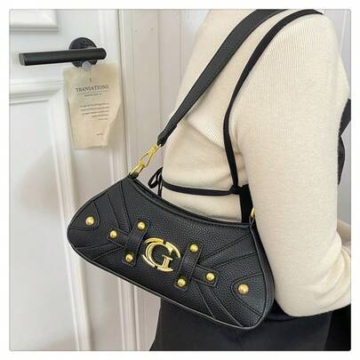 Featuring A Classic Crescent Hobo Silhouette With Decorative Rivet Studs And A Prominent Gold-Tone Logo Accent, This Bag Captures The Iconic 2000s Fashion Vibe, Making It A Standout Accessory For Y2K And Retro Style Lovers.