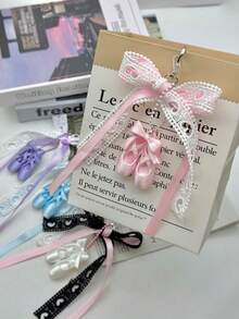 1 Móc khóa hình giày ba lê dễ thương - Phụ kiện túi xách nơ ren dành cho nữ, giày ba lê mini bằng satin với nơ ren lãng mạn và dải ruy băng mềm mại, hoàn hảo để thêm nét mềm mại, nữ tính cho túi xách, ba lô hoặc bộ chìa khóa của bạn. - Nhiều màu - Xem 5