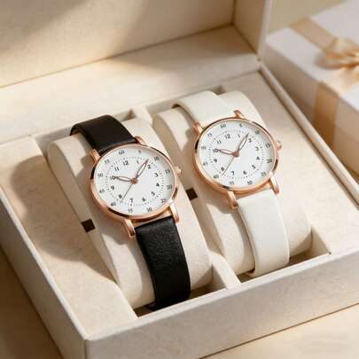 Bộ 2 đồng hồ đôi cổ điển mặt tròn, vỏ mạ vàng hồng, dây da đen trắng, vạch chỉ giờ rõ ràng, phù hợp cho đi làm và hẹn hò, quà tặng kỷ niệm tuyệt vời.