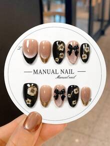 JUTI 10Pcs 100% Handmade Short Almond Glossy Press On Nails, Nude Cat Eye Gold French Tips Decorated With 3D Black Bow And Vintage White Floral Ornaments, Stylish Gorgeous Fake Nails.Set Comes With 1 Nail File And Jelly Gel. - Multicolor - View 1