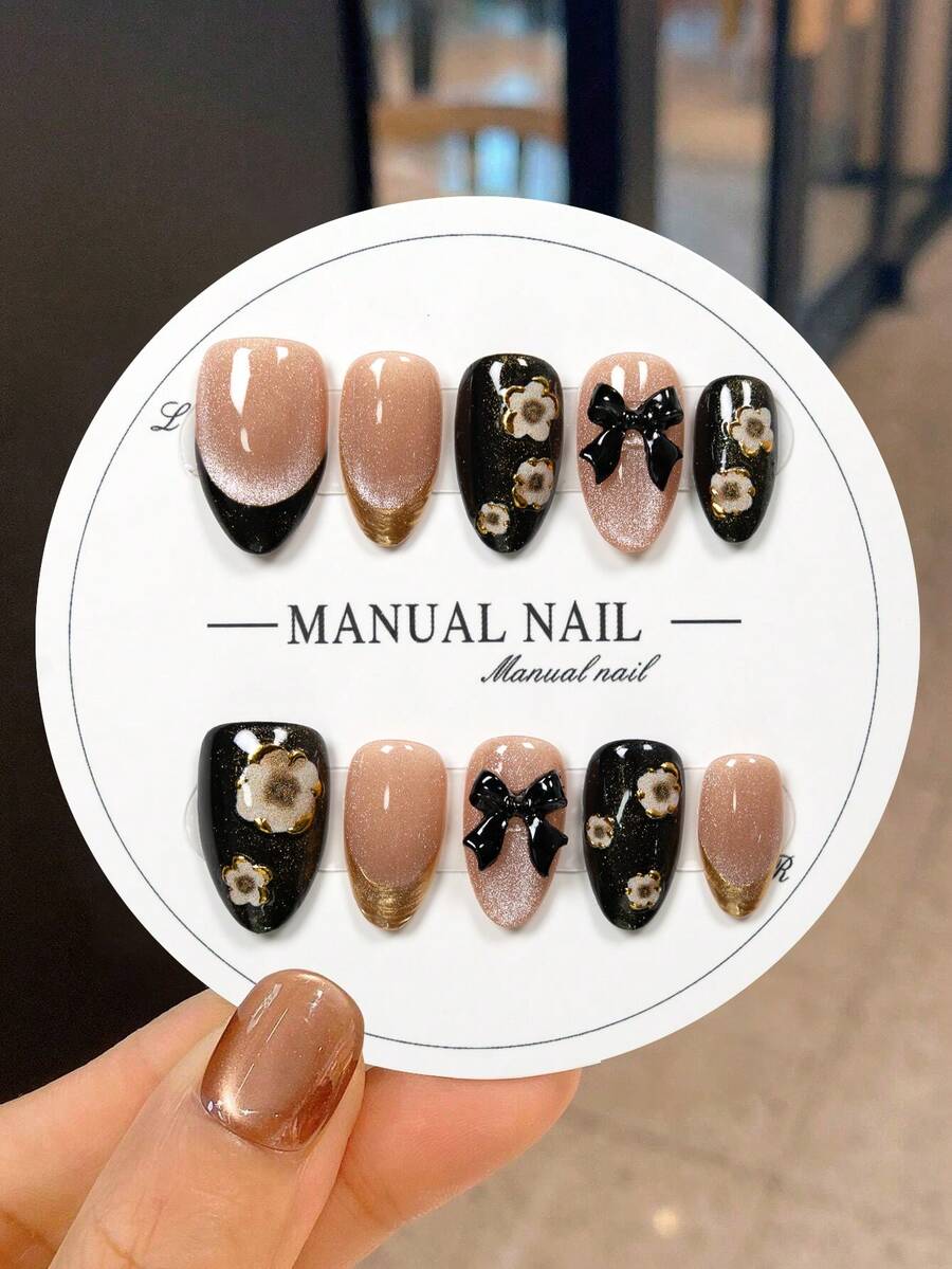 JUTI 10Pcs 100% Handmade Short Almond Glossy Press On Nails, Nude Cat Eye Gold French Tips Decorated With 3D Black Bow And Vintage White Floral Ornaments, Stylish Gorgeous Fake Nails.Set Comes With 1 Nail File And Jelly Gel. - Multicolor - View 1