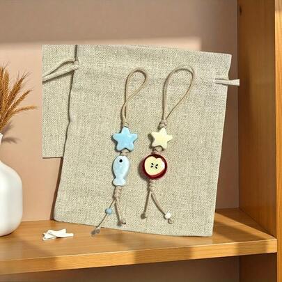 可爱鱼星吊坠包包挂件钥匙扣，仿苹果包包挂件，鱼形包包挂件，星星形包包挂件，仿海星包包挂件，海洋主题包包挂件，仿水果包包挂件，女士包包挂件，编织包包挂件，绳编包包挂件，手机壳链条包包挂件，情侣钥匙扣，送给朋友的最佳礼物