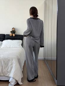 Dreamivo Bộ đồ ngủ nữ 2 món, áo tay dài và quần dài màu đen kẻ sọc hoa văn, có bèo nhún, đồ mặc nhà thoải mái với áo sơ mi cổ cài cúc và quần cạp chun. - màu đen - Xem 2