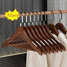 酒店级木质防滑无缝宽肩衣架，适用于家居收纳和衣橱升级，天然木质西装衣架，男女通用，加厚外套衣架，适用于衬衫、夹克和外套，无缝设计防止肩部压痕，宽肩设计最大限度利用收纳空间，是旅行或居家使用的理想之选，可轻松更新衣橱，优雅的北欧风格木质衣架，适合日常使用，优质饰面和强大的承重能力 - 查看 1