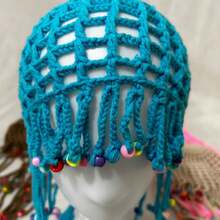 This Playful Crocheted Hat Features A Whimsical Dreadlock-Style Design, With Long Tassels Adorned With Colorful Beads For A Fun, Retro Vibe. Handcrafted From Soft, Stretchy Yarn, It Offers A Cozy Fit And Eye-Catching Appeal-Perfect For Festivals, Costume Parties, Or Bold Everyday Looks. Its Unique, Handmade Aesthetic Adds A Quirky, Bohemian Touch To Any Outfit, Making It A Standout Accessory For Those Who Love To Express Their Playful Side. - màu xanh da trời - Xem 3