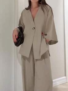 Bộ đồ nữ thường ngày gồm áo cổ chữ V dáng rộng và quần ống rộng, chất liệu vải dệt màu trơn, thích hợp cho mùa hè và mùa xuân. - Xám - Xem 9