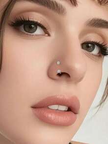 Bộ 4 khuyên mũi gồm [2 khuyên mũi + 1 dụng cụ nong lỗ xỏ + 1 dụng cụ gắp bi]. Khuyên mũi hình móng ngựa bằng thép không gỉ, đính đá Cubic Zirconia 3mm, dành cho nữ. Khuyên mũi cỡ 18G với các hình trái tim, ngôi sao và hình tròn. Thích hợp cho môi, lông mày, vành tai, hình móng ngựa, vách ngăn mũi và các vị trí xỏ khuyên khác. Đá Cubic Zirconia màu trắng và hồng. - Nhiều màu - Xem 9