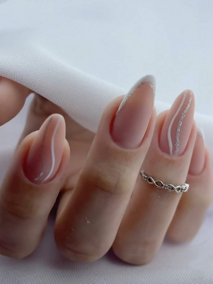 24pcs Short Almond-Shaped Nail Art Set, White Curved Lines Outline Dynamic Arches, Paired With Parallel Silver Glitter Thin Lines. Minimalist French White Edges + Silver Glitter Accents, Silver Glitter Lining On Nail Edges, Understated Yet Elegant. - Multicolor - View 1
