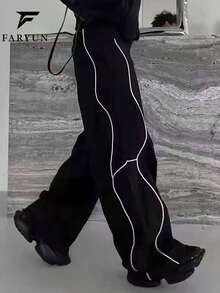 Quần dài nam dáng casual có dây rút ở eo, phối màu tương phản với túi hai bên, phù hợp cho đi làm hàng ngày và phong cách đường phố, kiểu dáng xuân hè. - màu đen - Xem 4