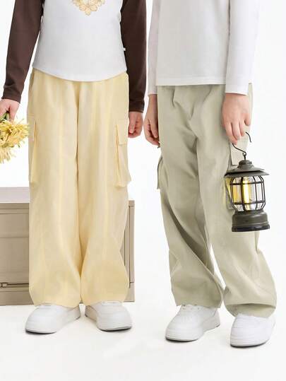 Annil Quần dài kiểu dáng quần áo lao động cho trẻ em, quần ống đứng thể thao thời trang mùa xuân mới cho bé trai và bé gái.