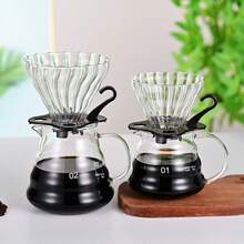 Un juego de cafetera de vidrio, que incluye una cafetera de goteo con embudo y filtro de goteo. Es una olla para compartir con un filtro de café. Un juego de cafetera de goteo manual para el hogar. Hecho de vidrio borosilicato con forma de nube. - Multicolor - Ver 4