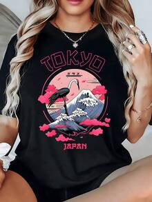 Grulla elegante frente al monte y las olas simbolizando armonía fuerza y esperanza con tonos rosados inspirados en la cultura japonesa camiseta de mujer moderna 220g - Negro - Ver 1