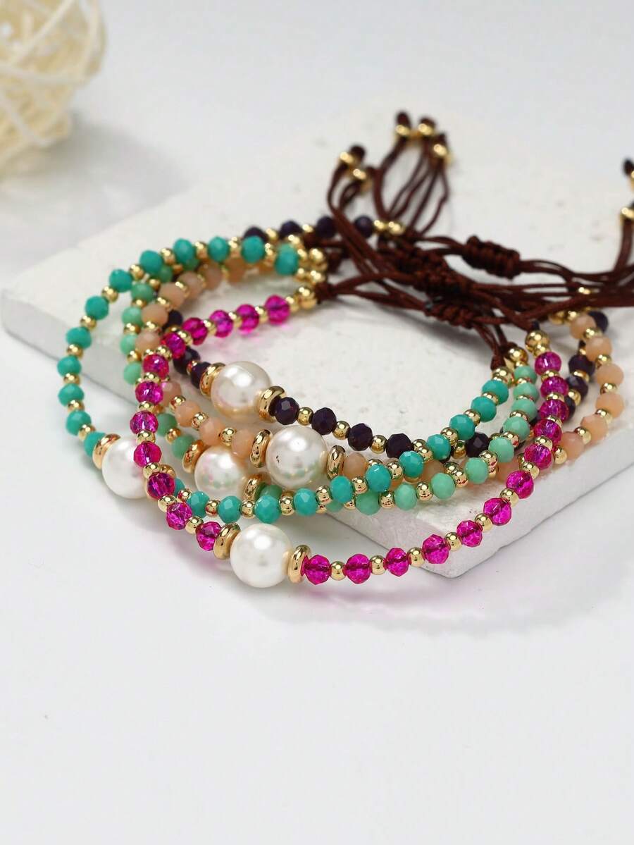 1. Vòng tay nữ bằng thủy tinh giả ngọc trai đơn giản, có thể điều chỉnh kích thước, thích hợp làm quà tặng.