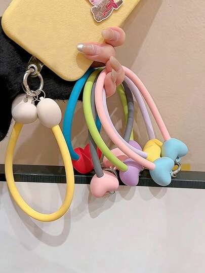 Pulsera de silicona con forma de corazón de colores, cordón universal anti-caída para teléfono, lindo brazalete de funda para teléfono, llavero y pequeños accesorios