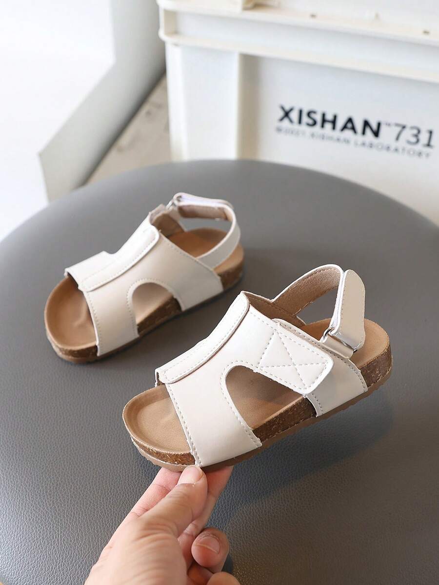 1 đôi dép xăng đan đế mềm rỗng cho bé gái, dép xăng đan mùa hè thời trang mới có khóa dán cho bé trai và bé gái. - trắng - Xem 1