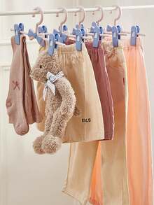 迷你防滑衣架，可调节弹力防皱裤架，家用防滑晾衣架。收纳整理，家居生活，方便实用。 - 粉色 - 查看 8