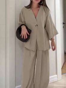 Bộ đồ nữ thường ngày gồm áo cổ chữ V dáng rộng và quần ống rộng, chất liệu vải dệt màu trơn, thích hợp cho mùa hè và mùa xuân. - Xám - Xem 8