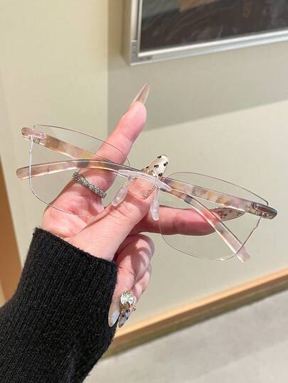 1副女士无度数眼镜，新款高端复古无框轻便便携休闲素颜日常佩戴，适合通勤、上网、办公等场合。