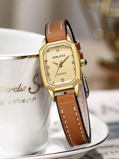1 chiếc đồng hồ nữ thạch anh sang trọng, thanh lịch, mặt số bát giác độc đáo, vỏ mạ vàng, chất liệu hợp kim cao cấp, phong cách thời trang cổ điển, tối giản tinh tế, hoàn hảo cho trang phục thường ngày, đi làm, dự tiệc, đám cưới, các buổi họp mặt Ramadan và nhiều dịp khác.