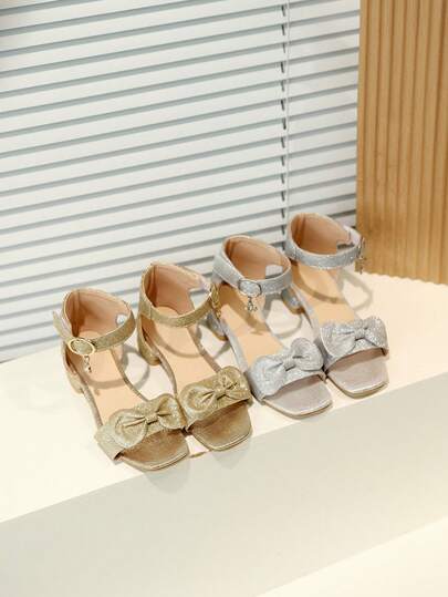 1 Pair Gold Shiny Bow Decor PU Leather High Heel Sandals For Big Kids, Classic Retro Color Tone, Convenient Hook And Loop Design, Non-Slip Rubber Thick Sole, Suitable For Princess Dress And Sundress, Ideal For Daily Gathering, Outdoor, Beach, 2026 Spring/Summer New Arrival
