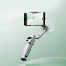 dji The Osmo Mobile 7 Is A Lightweight And Fast Smartphone Stabilizer With Intelligent Tracking, A Selfie Stick, Portability, Long Battery Life, And Is A Must-Have For Live Streaming And Vlog Shooting. It Features Intelligent Image Stabilization, Is Foldable, And Has A Built-In Tripod. - White - View 2