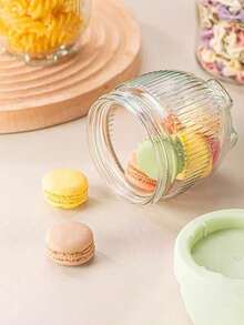 2 hũ thủy tinh nhỏ hình chân mèo, có nắp đậy kín, dùng để đựng ngũ cốc, trái cây khô và đồ ăn nhẹ. - Xem 2