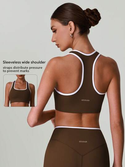 Áo tập thể thao nữ phối màu, cổ tròn rộng, dáng racerback, hỗ trợ cao, thích hợp cho mọi mùa.