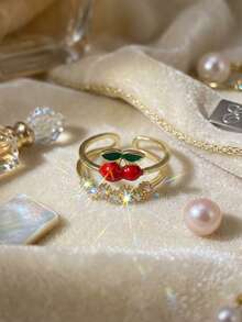 1 pieza Anillo abierto con forma de cereza chapado en oro de 18K, incrustado con circonita, adecuado para niñas jóvenes, madres, maestras, estilo bohemio, esencial para playa de verano, viajes, fiestas, carnaval/graduación, baile/fiesta/accesorio diario, joyería dorada, regalo de vuelta al colegio/cumpleaños - Dorado - Ver 3