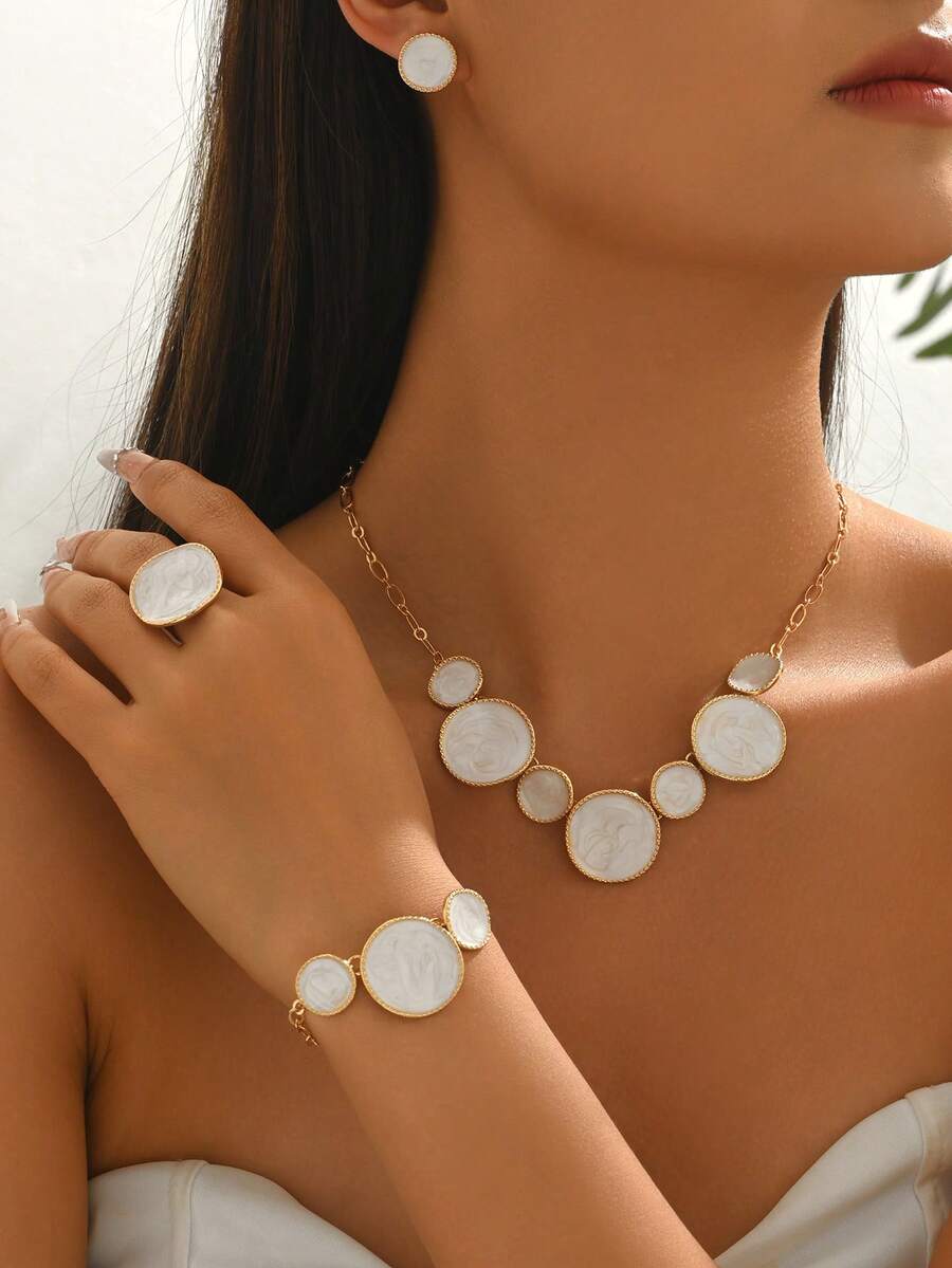 Bộ trang sức 4 món màu trắng, kiểu dáng bất đối xứng, họa tiết giọt dầu tròn - Vòng tay, dây chuyền, bông tai, nhẫn, thiết kế độc đáo, chất liệu ngẫu nhiên. - Nhiều màu - Xem 1