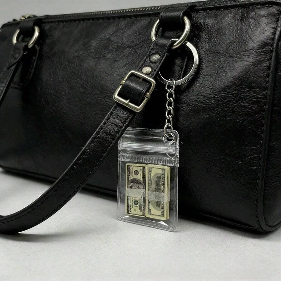 这款独一无二的手工包包挂饰钥匙扣和迷你钱包，以仿美元钞票为造型，是送给朋友的完美礼物。 - 彩色 - 查看 1