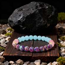 一套9条神奇水晶手链，象征着和平、财富、繁荣、友谊、好运、爱情和守护。水晶珠带来乐观积极、自信和力量，弹性手链，适合作为送给男友/女友的礼物。 - 多色 - 查看 3