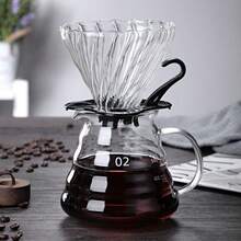 Un juego de cafetera de vidrio, que incluye una cafetera de goteo con embudo y filtro de goteo. Es una olla para compartir con un filtro de café. Un juego de cafetera de goteo manual para el hogar. Hecho de vidrio borosilicato con forma de nube. - Multicolor - Ver 10
