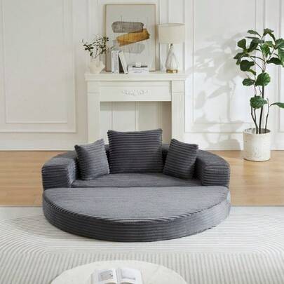 A Versatile Two-In-One Sofa Bed, Ideal For Small Spaces, That Can Be Used As Both A Semi-Circular Sofa And A Round Chaise Longue. The Armrests Feature Fabric Pockets.