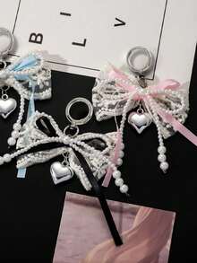Y2K 可爱简约时尚串珠珍珠蝴蝶结，搭配心形吊坠，多功能 DIY 钥匙扣/包包挂件套装，钱包配件，带安全扣，可作手机壳挂件，适合情侣、女士、女孩和闺蜜日常外出佩戴。是节日礼物的理想之选，例如情人节、复活节、母亲节、独立日、婚礼季、毕业季等。 - 彩色 - 查看 9