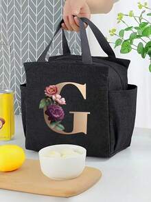 这款保温午餐包采用铝箔内衬，饰有色彩缤纷的A-Z字母和花卉图案，容量大，保温保鲜效果极佳，采用加厚铝箔材质，并配有便捷提手。适合通勤、旅行、野餐、露营以及上班族返校季使用。 - 黑色 - 查看 25