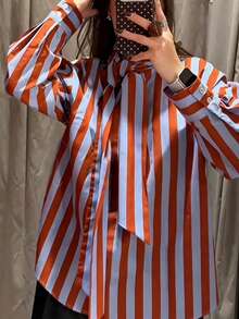 Áo sơ mi nữ thanh lịch với họa tiết sọc tương phản và nơ, kiểu dáng mới cho mùa xuân hè, thích hợp mặc đi nghỉ mát hoặc đi chơi. - Đỏ - Xem 1