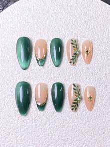 10片手工制作的按压式美甲贴片，短款美甲，假指甲，法式美甲贴片，杏仁形美甲，闪亮绿色猫眼美甲，裸色美甲，自然风美甲，春季美甲，手绘树叶和星爆图案，金色镶边和绿色水钻装饰，包含美甲工具，快速贴合和卸除，适合女性和女孩。绿色猫眼杏仁形美甲贴片 - 綠色 - 查看 5